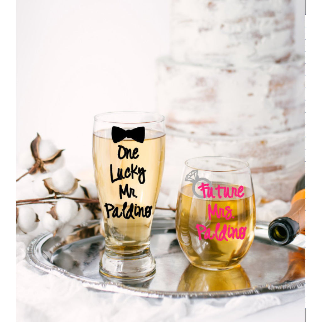 one lucky mr and bow tie with black text and future mrs stemless wine glass